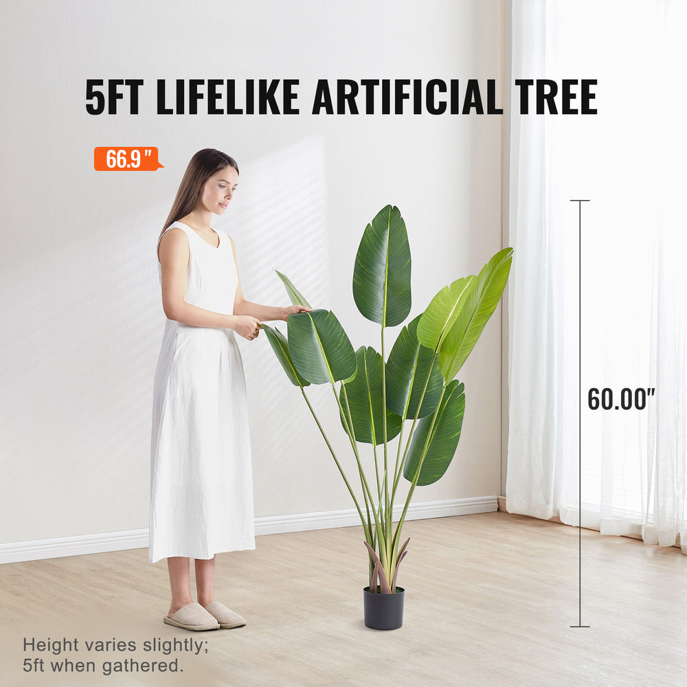 Artificial Birds Of Paradise Tree, 5 FT Tall Faux Plant, PE Material & Anti-Tip Tilt Protection Low-Maintenance Plant, Lifelike Green Fake Tree for Home Office Warehouse Decor Indoor Outdoor Media 10