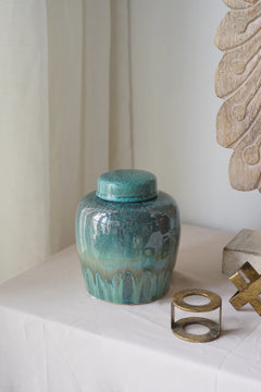 Round Ceramic Lidded Jar With Reactive Glaze And Subtle Ridges perspective