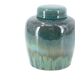Round Ceramic Lidded Jar With Reactive Glaze And Subtle Ridges perspective