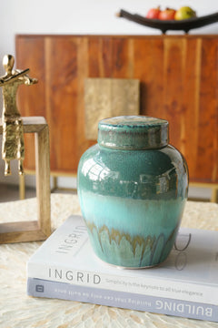 Round Ceramic Lidded Jar With Reactive Glaze And Subtle Ridges perspective