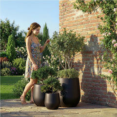 DTY Signature Mount Wilson Modern Indoor Outdoor Fiberstone Tapered Planter, Lightweight, Weather Resistant Garden Pot with Drainage Hole & Rubber Plug (Black, 11'' D x 12'' H) perspective