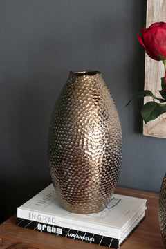 Decorative Ceramic Vase with Textured Bronze Finish perspective