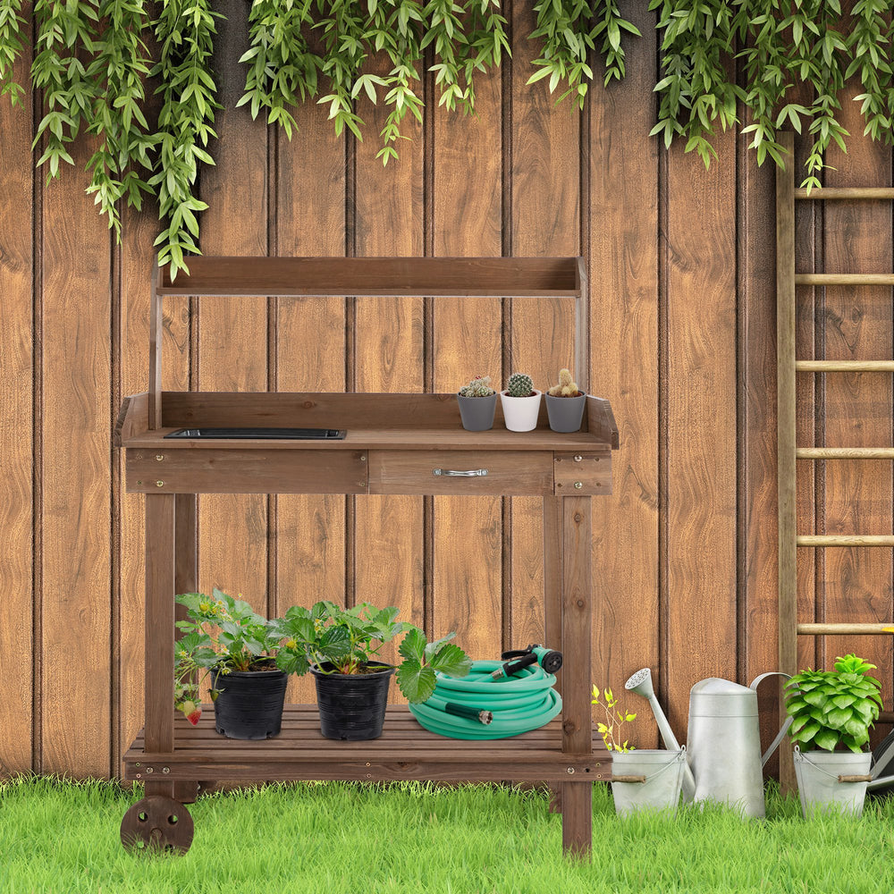 Outsunny 36'' Wooden Potting Bench Work Table with 2 Removable Wheels, Sink, Drawer & Large Storage Spaces, Brown Media 2