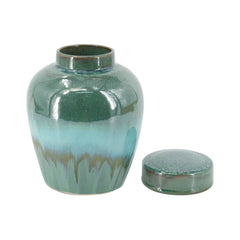 Round Ceramic Lidded Jar With Reactive Glaze And Subtle Ridges perspective